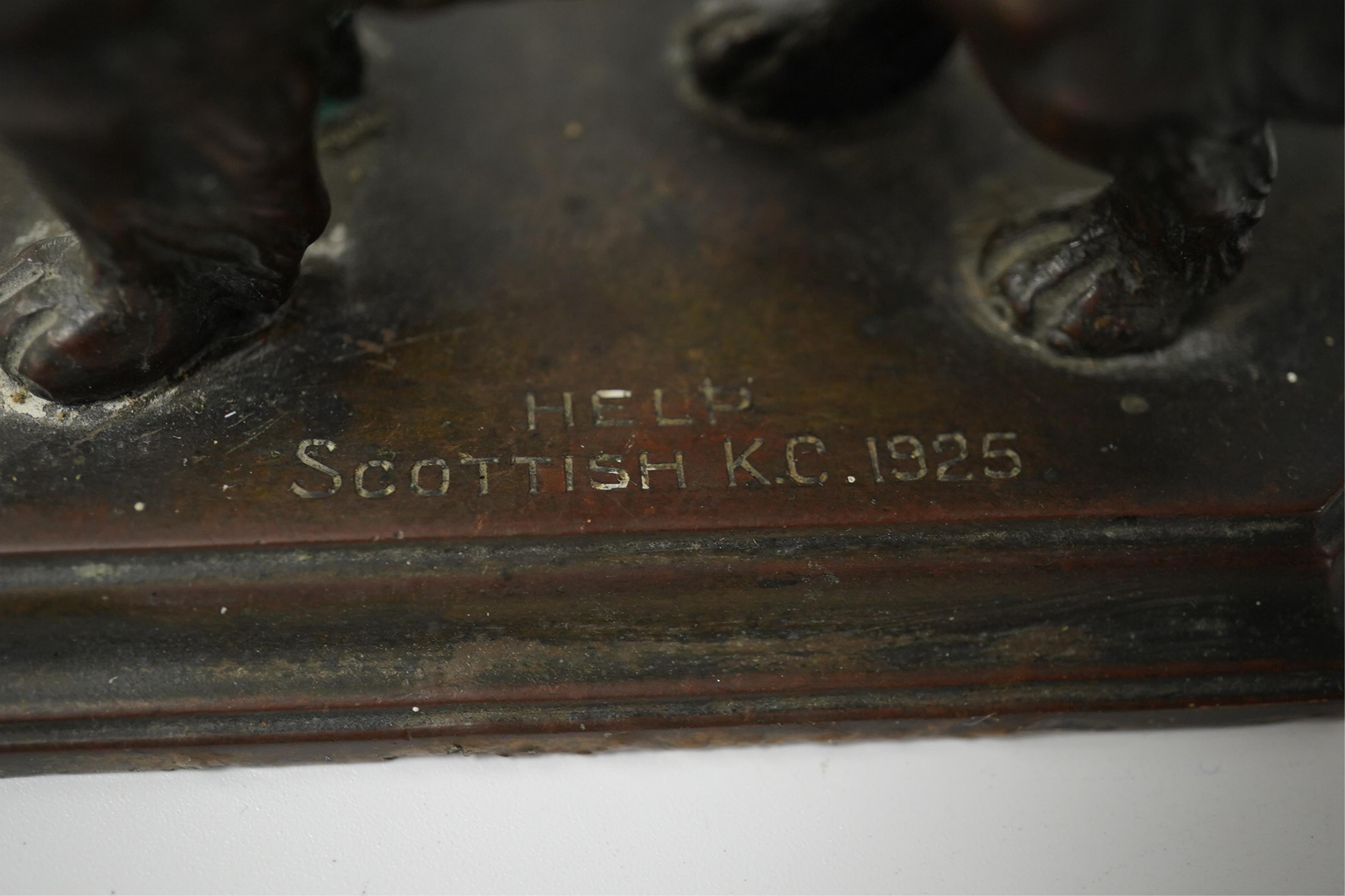 A bronze of a Newfoundland Terrier, inscribed on base Help Scottish KC 1925, 10cm wide. Condition - good